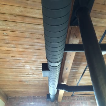 Grant Mill - Exposed ductwork and refurnished wood ceilings. - Apartments Near Me - Providence, Rhode Island Grant Mill - Exposed ductwork and refurnished wood ceilings. - Apartments Near Me - Providence, Rhode Island