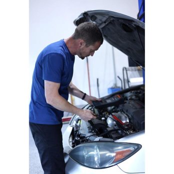 Japanese Auto Repair - Auto mechanic, Tony, working under the hood of a vehicle - Auto Repair Near Me - Suwanee, Georgia Japanese Auto Repair - Auto mechanic, Tony, working under the hood of a vehicle - Auto Repair Near Me - Suwanee, Georgia