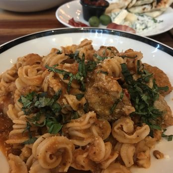 Von's 1000Spirits - Homemade Spicy Fennel Meatballs on housecrafted sourdough pasta - New American Near Me - Seattle, Washington