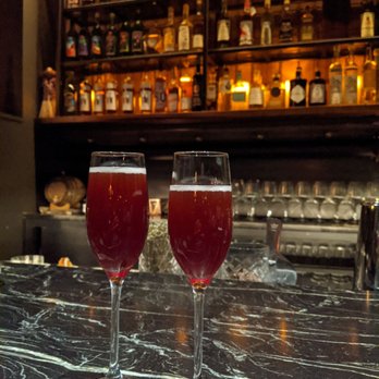 Dram & Grain - two glasses of wine on a bar - Whiskey Bars Near Me - Washington, DC, District of Columbia Dram & Grain - two glasses of wine on a bar - Whiskey Bars Near Me - Washington, DC, District of Columbia