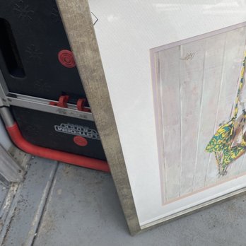 Titan Relocation Services - Broken picture that was under all the things on the patio - Movers Near Me - Whittier, California