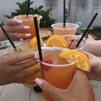 Pusser's Landing - Marina Cay Champagne (mango juice and champagne), Rum Punch & Orange Crushes - Specialty Food Near Me - Baltimore, Maryland