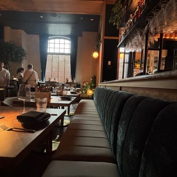 V Modern Italian - Dining room with booths - Italian Near Me - Charleston, South Carolina V Modern Italian - Dining room with booths - Italian Near Me - Charleston, South Carolina