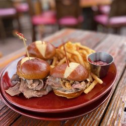 Brick & Bourbon - Tenderloin sliders on pretzel bun