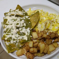 Guisados Jalisco - Green sauce Chilaquiles, eggs and country potatoes.