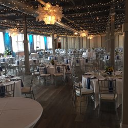 Foundry Suites - Main ballroom, decorated for dinner.