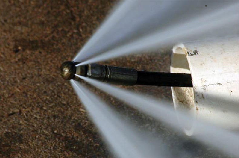 Slide of Suburban Sewer & Septic