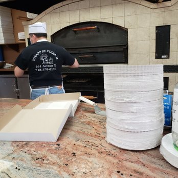 Knapp Pizza II - a man working in a kitchen - Pizza Near Me - Brooklyn, New York
