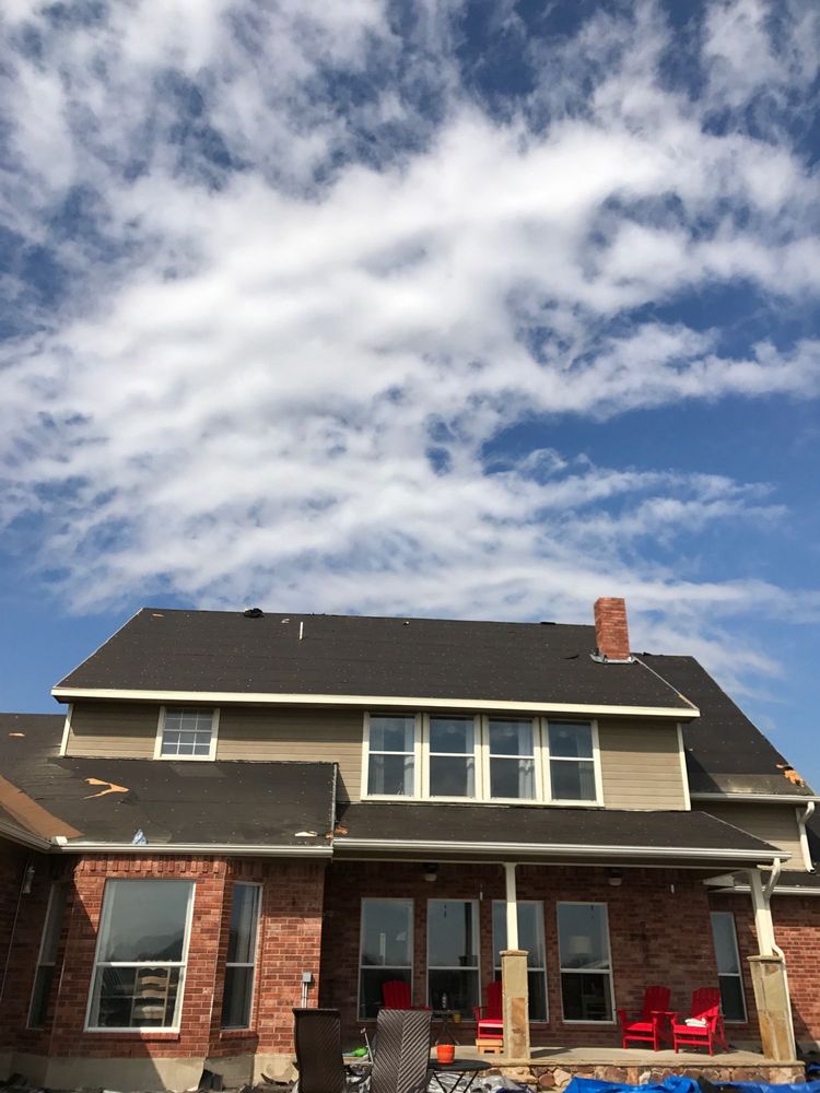 Slide of Rick's Roofing & Construction