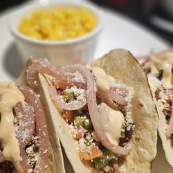 The street tacos were ok came with corn that we didnt understand and tasted and looked like they came straight out of a can.