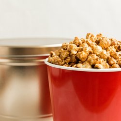 Woody's Popcorn - Traditional handcrafted popcorn stirred and popped to pure perfection.