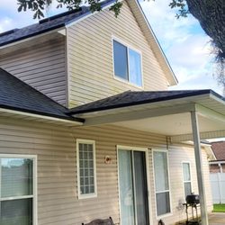 Nubirth Pressure Washing - Two story vinyl cleaning.