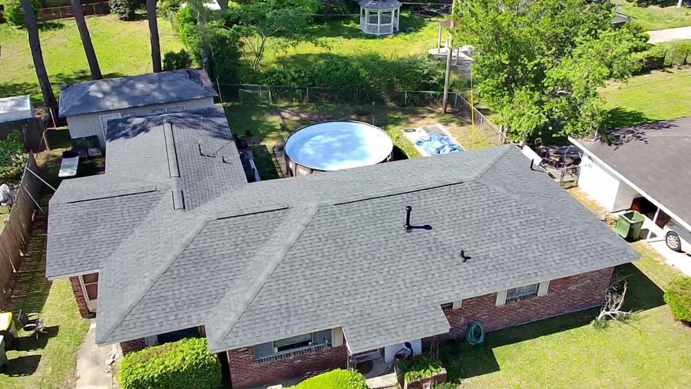 Slide of Palma's Roofing Experts