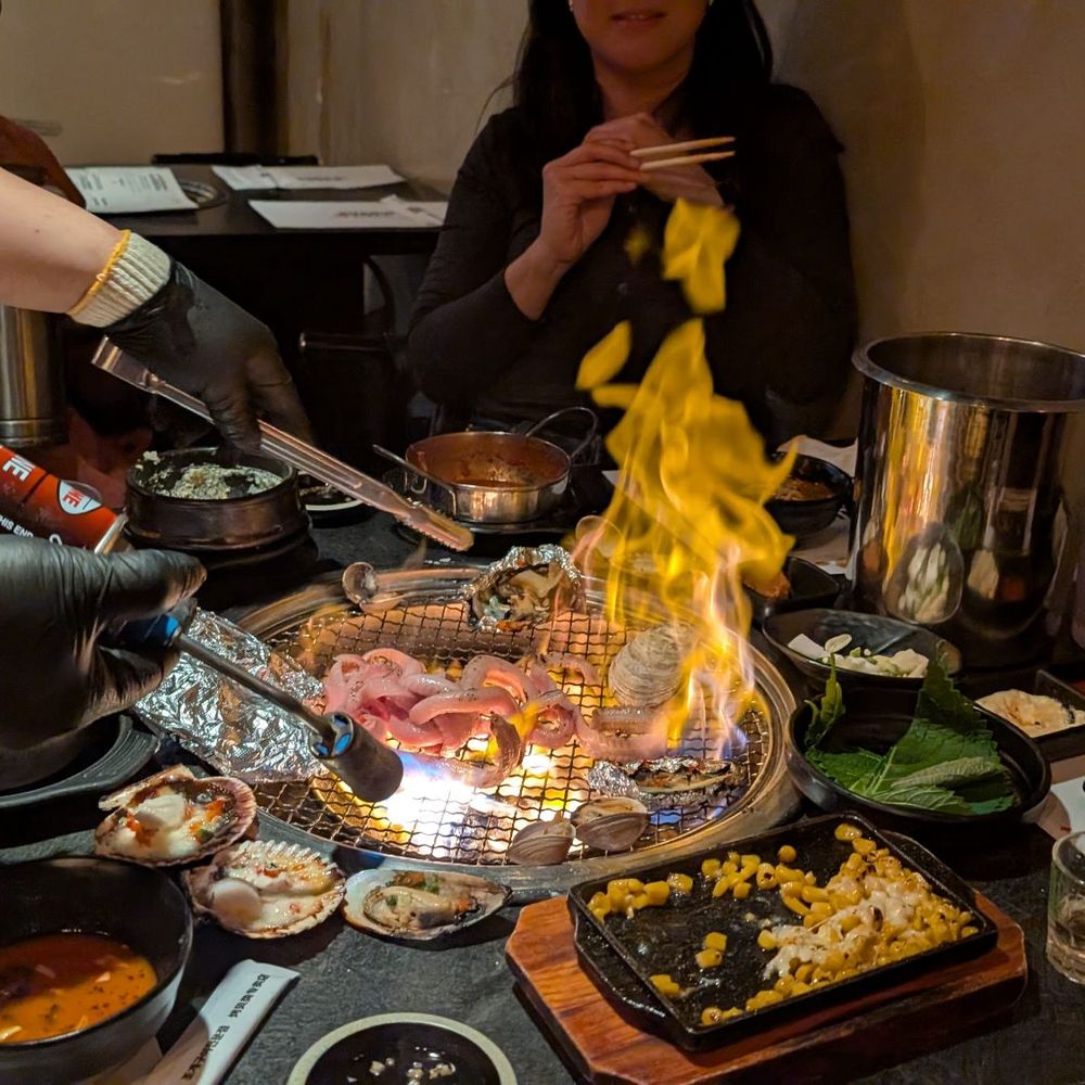 Burnin' Shell - Buttered squid being grilled and torched - Seafood Near Me - Los Angeles, California Burnin' Shell - Buttered squid being grilled and torched - Seafood Near Me - Los Angeles, California