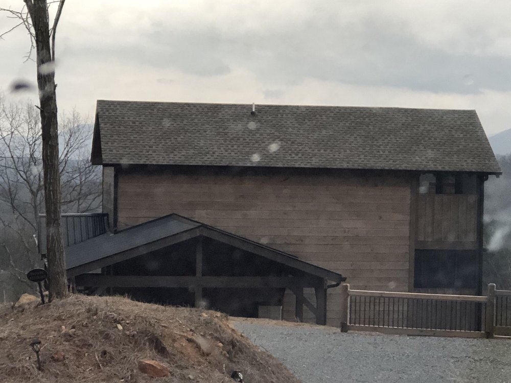 Slide of Sutton Roofing & Construction Company