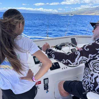 Aloha Blue Charters - Our Captain showing my Daughter how to read the underwater scanner - Boat Charters Near Me - Wailuku, Hawaii Aloha Blue Charters - Our Captain showing my Daughter how to read the underwater scanner - Boat Charters Near Me - Wailuku, Hawaii