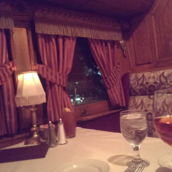 Inside Booth Of A Train Car For Dinner At Rods Steakhouse Call To