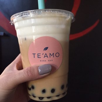 Te'amo Boba Bar - Mango milk tea with tapioca and a white mustache - Bubble Tea Near Me - Chicago, Illinois Te'amo Boba Bar - Mango milk tea with tapioca and a white mustache - Bubble Tea Near Me - Chicago, Illinois