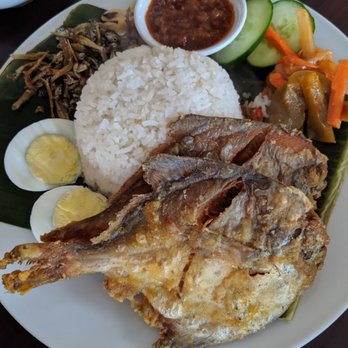 Kurumba Restaurant - Nasi Lemak with whole fried fish, egg, coconut rice, fried anchovies - Malaysian Near Me - Port Moody, British Columbia Kurumba Restaurant - Nasi Lemak with whole fried fish, egg, coconut rice, fried anchovies - Malaysian Near Me - Port Moody, British Columbia
