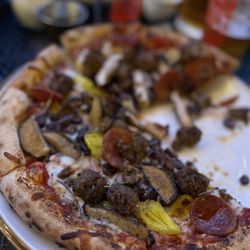 Tamboli's Pasta & Pizza - Spicy Italian Sausage Pizza with Honey