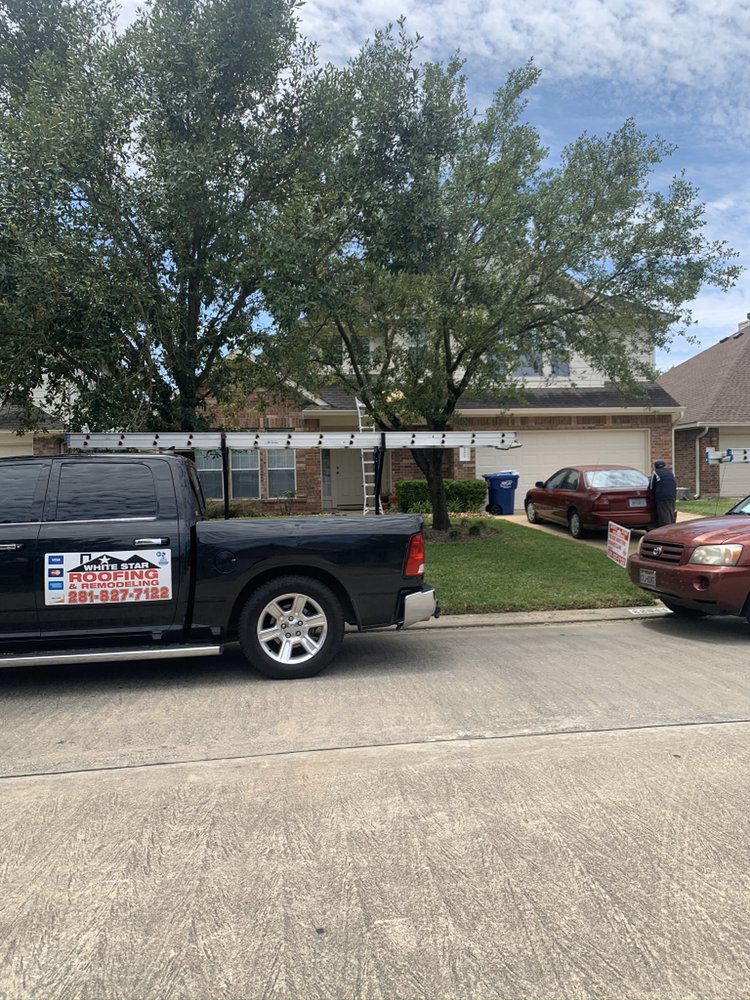 Slide of White Star Roofing