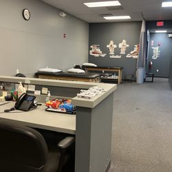 ATI Physical Therapy - Therapist's Station and exercise tables