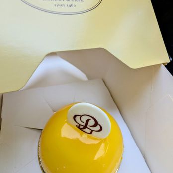 Porto's Bakery & Cafe - Mango Mousse Bomb - Bakeries Near Me - Burbank, California Porto's Bakery & Cafe - Mango Mousse Bomb - Bakeries Near Me - Burbank, California