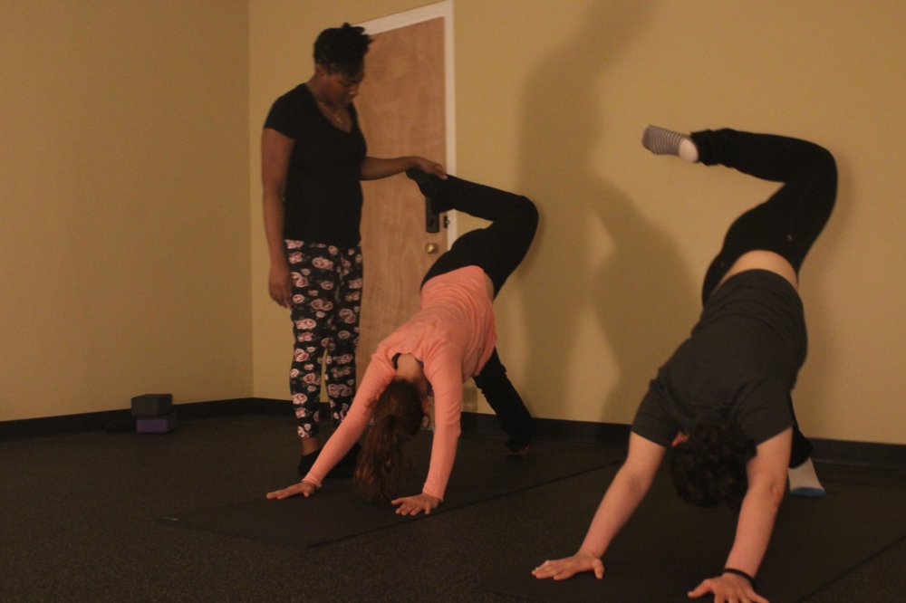 The Yoga Marque Logo