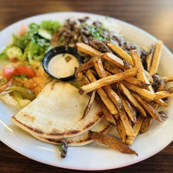 Mezza Mediterranean Grill - Beef Shawarma plate (there is more beef hiding under the fries) - Mediterranean Near Me - Parker, Colorado Mezza Mediterranean Grill - Beef Shawarma plate (there is more beef hiding under the fries) - Mediterranean Near Me - Parker, Colorado