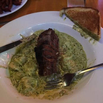 Cleary's Pub - Blackened sirloin ordered to temp w cheese tortellini in pesto cream sauce - Pubs Near Me - Chelsea, Michigan