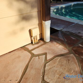 Water Drainage Innovations - a pool in the background - Irrigation Near Me Water Drainage Innovations - a pool in the background - Irrigation Near Me