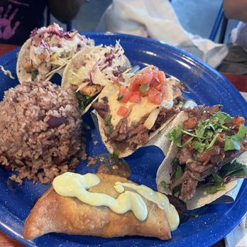 The Rum House - Taco plate with rice and empanada - Caribbean Near Me - New Orleans, Louisiana The Rum House - Taco plate with rice and empanada - Caribbean Near Me - New Orleans, Louisiana