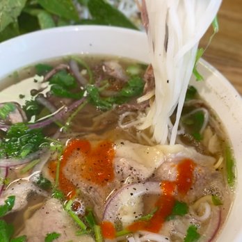 99 Fast Food - 28. (Phở Tái Chín) - beef noodle soup with sliced rare beef and brisket - Vietnamese Near Me - Buffalo, New York