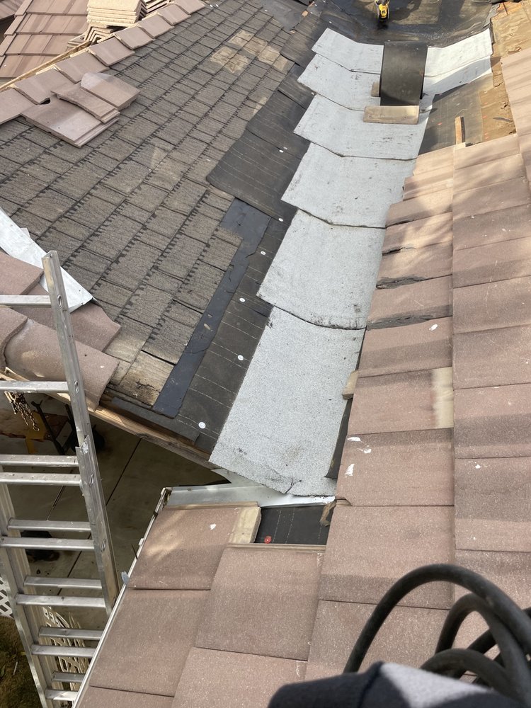Slide of OT Roofing