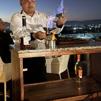 Quinto - Prep for filet mignon flambé - Steakhouses Near Me - Nuevo Vallarta, NAY Quinto - Prep for filet mignon flambé - Steakhouses Near Me - Nuevo Vallarta, NAY