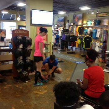 Big Peach Running Co. - Midtown - From Facebook Page-Shot inside the store/Good Form Running Coach showing how to use cadence sensors - Sports Wear Near Me - Atlanta, Georgia