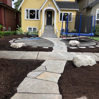 Crocus Landscaping - a walkway leading to a house - Landscaping Near Me Crocus Landscaping - a walkway leading to a house - Landscaping Near Me