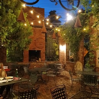 Mona Lisa's - Gorgeous hidden back patio. - Italian Near Me - Eau Claire, Wisconsin Mona Lisa's - Gorgeous hidden back patio. - Italian Near Me - Eau Claire, Wisconsin