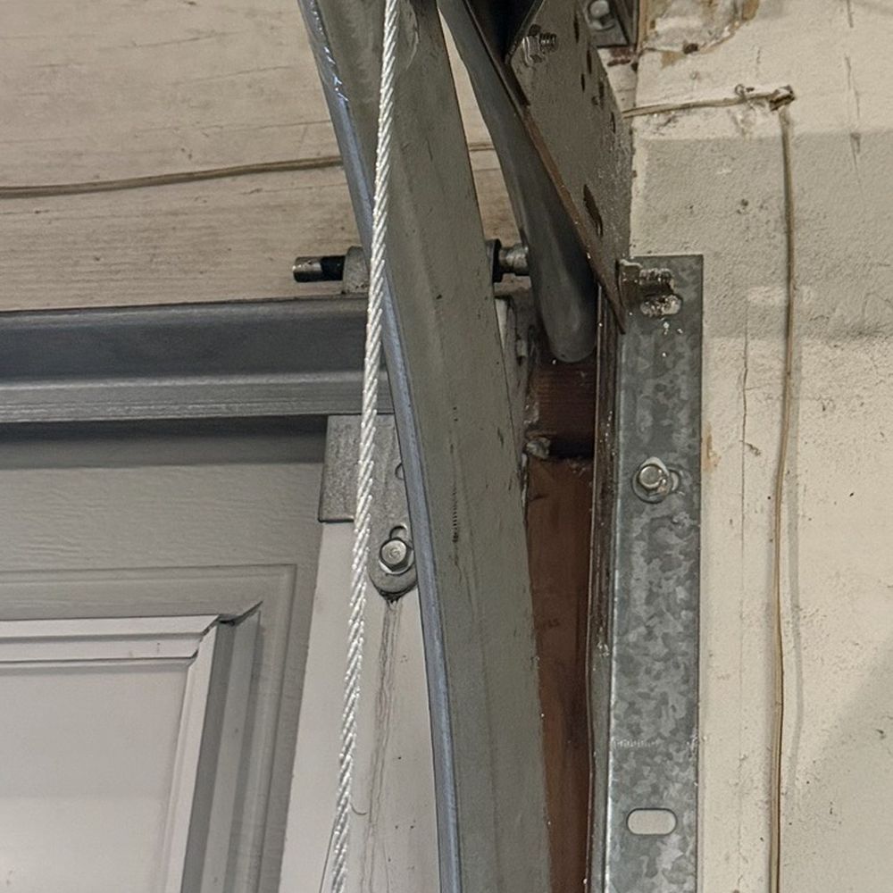 Eric Garage Door Repair - New cable installed over existing equipment - Garage Door Services Near Me - Arcadia, California