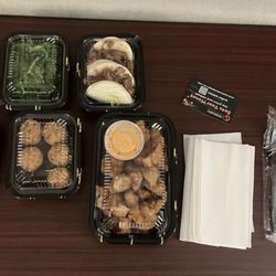 L-R Harumaki, Seaweed Salad, Sesame Balls, Chashu Bun 2 pcs, Chicken Karaage and the niceties of a to-go bag. 22DEC24