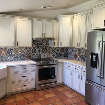 AZ Stone & Tile Concepts - a kitchen with stainless steel appliances - General Contractors Near Me - Phoenix, Arizona AZ Stone & Tile Concepts - a kitchen with stainless steel appliances - General Contractors Near Me - Phoenix, Arizona