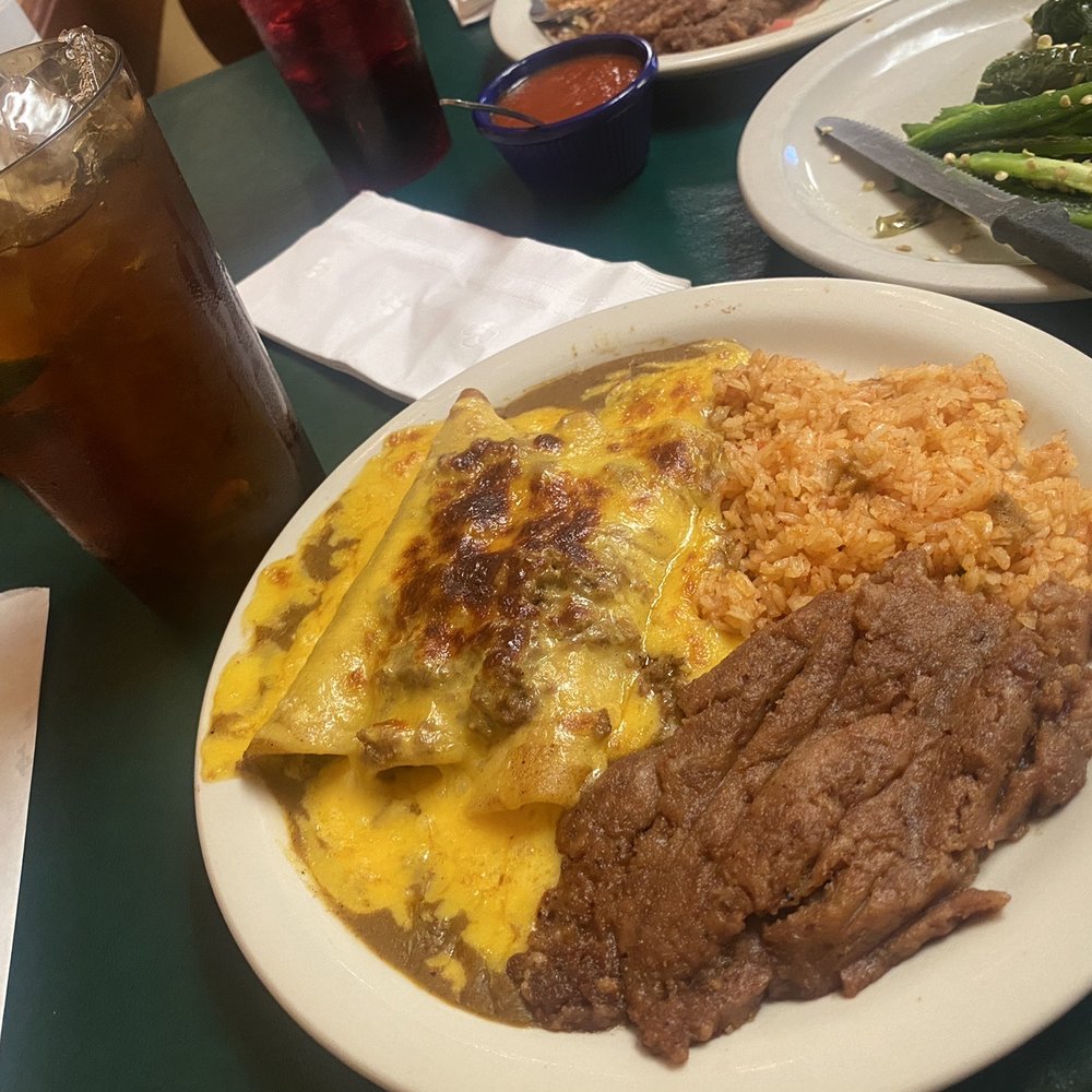 Cheese Enchiladas Plate with beef and toasted top. Cheese Enchiladas Plate with beef and toasted top.