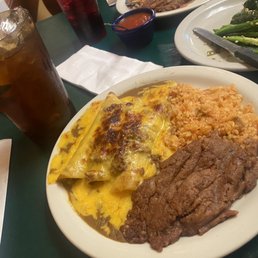 Cheese Enchiladas Plate with beef and toasted top. Cheese Enchiladas Plate with beef and toasted top.