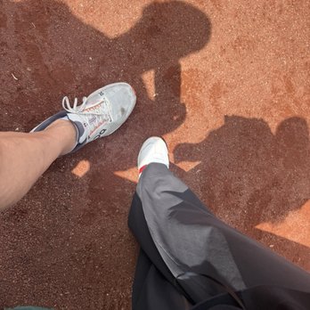Citizens Bank Park - Our feet on the field behind home plate - Stadiums & Arenas Near Me - Philadelphia, Pennsylvania