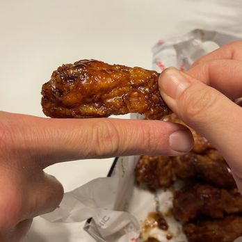 bb.q Chicken Pasadena - Another avg size wing in my order - Chicken Wings Near Me - Pasadena, California