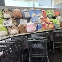 Huge Squishmallows by the carts