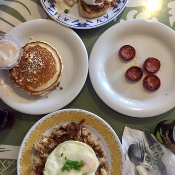 808 Grindz Cafe - Macadamia pancakes with mac-nilla sauce, shredded pork moco, da bene trio and a side of Portuguese sausage - Cafes Near Me - Lahaina, Hawaii 808 Grindz Cafe - Macadamia pancakes with mac-nilla sauce, shredded pork moco, da bene trio and a side of Portuguese sausage - Cafes Near Me - Lahaina, Hawaii