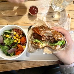 The Rockeuse burger with a side of quinoa salad. The Rockeuse burger with a side of quinoa salad.