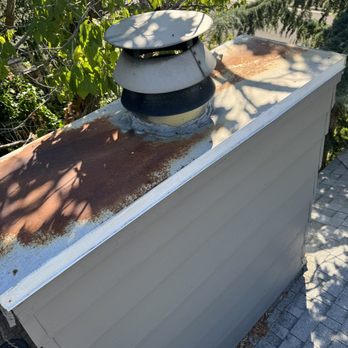 EagleRidge Roofing and Construction - Ponding water on chimney cap potential leak. - Roofing Near Me - Kaysville, Utah EagleRidge Roofing and Construction - Ponding water on chimney cap potential leak. - Roofing Near Me - Kaysville, Utah