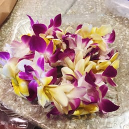 Fresh Plumeria and Orchid Lei. Other varieties available at the back of the store. Fresh Plumeria and Orchid Lei. Other varieties available at the back of the store.